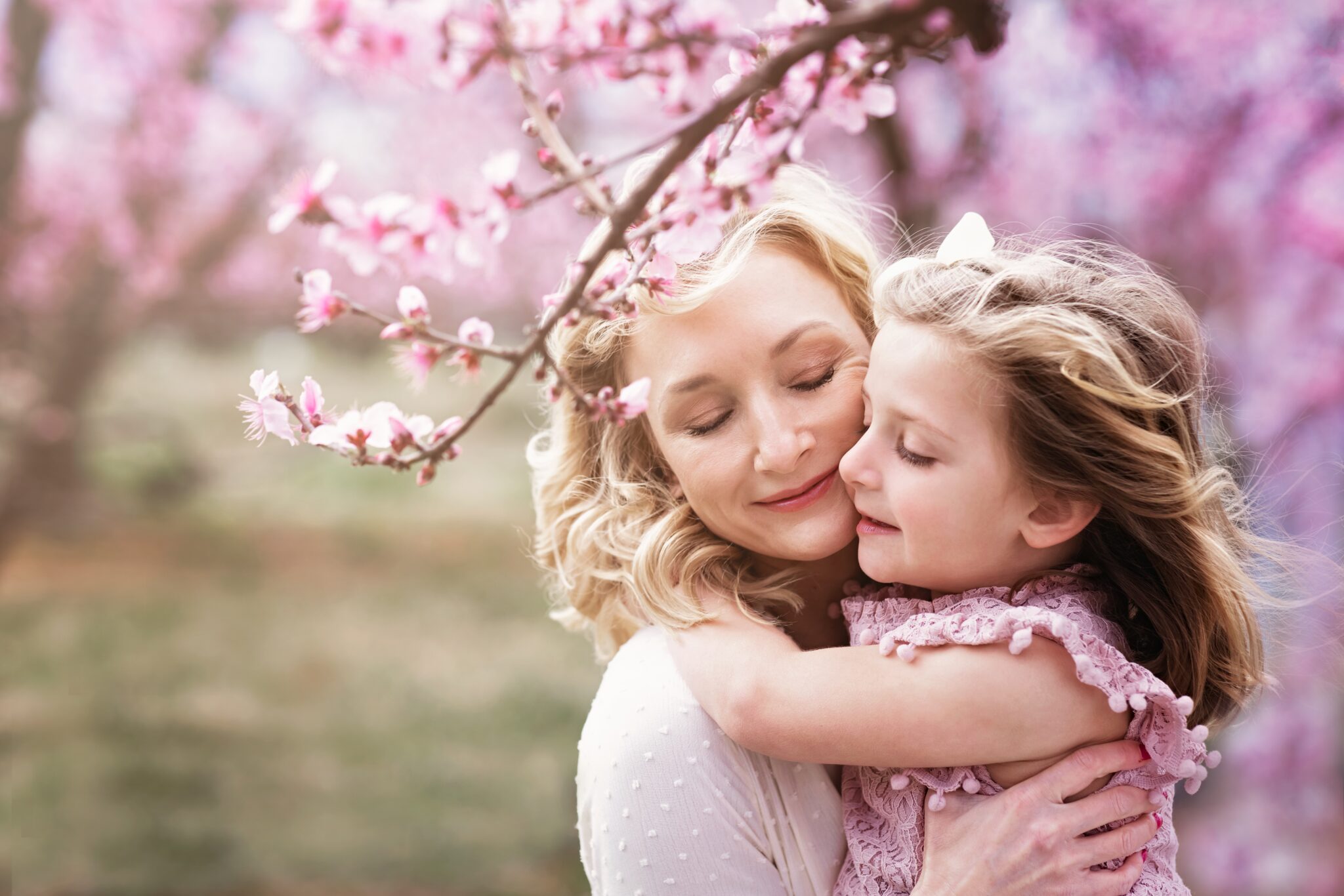 Mother and daughter in the peach orchards