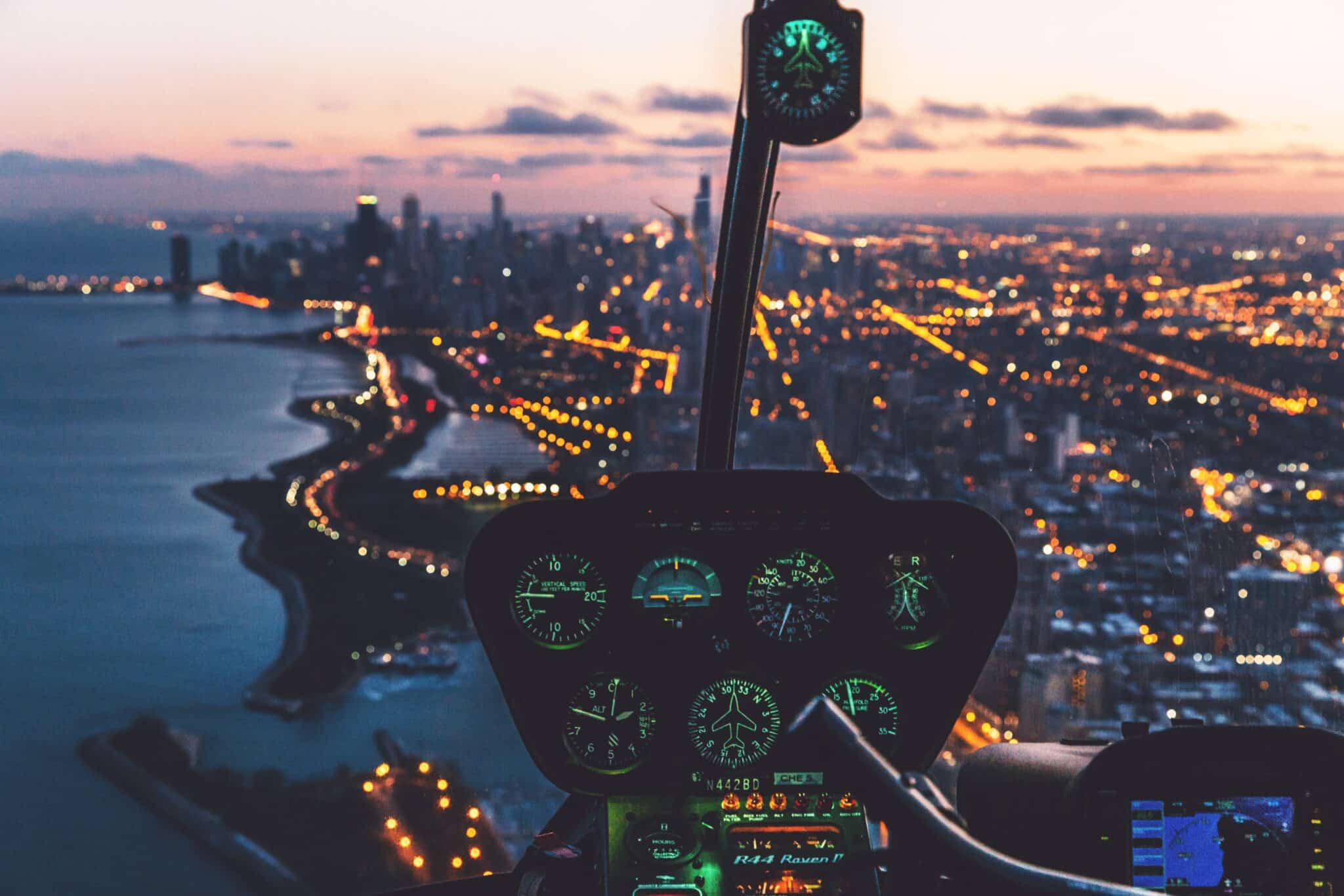 Helicopter and city at dusk