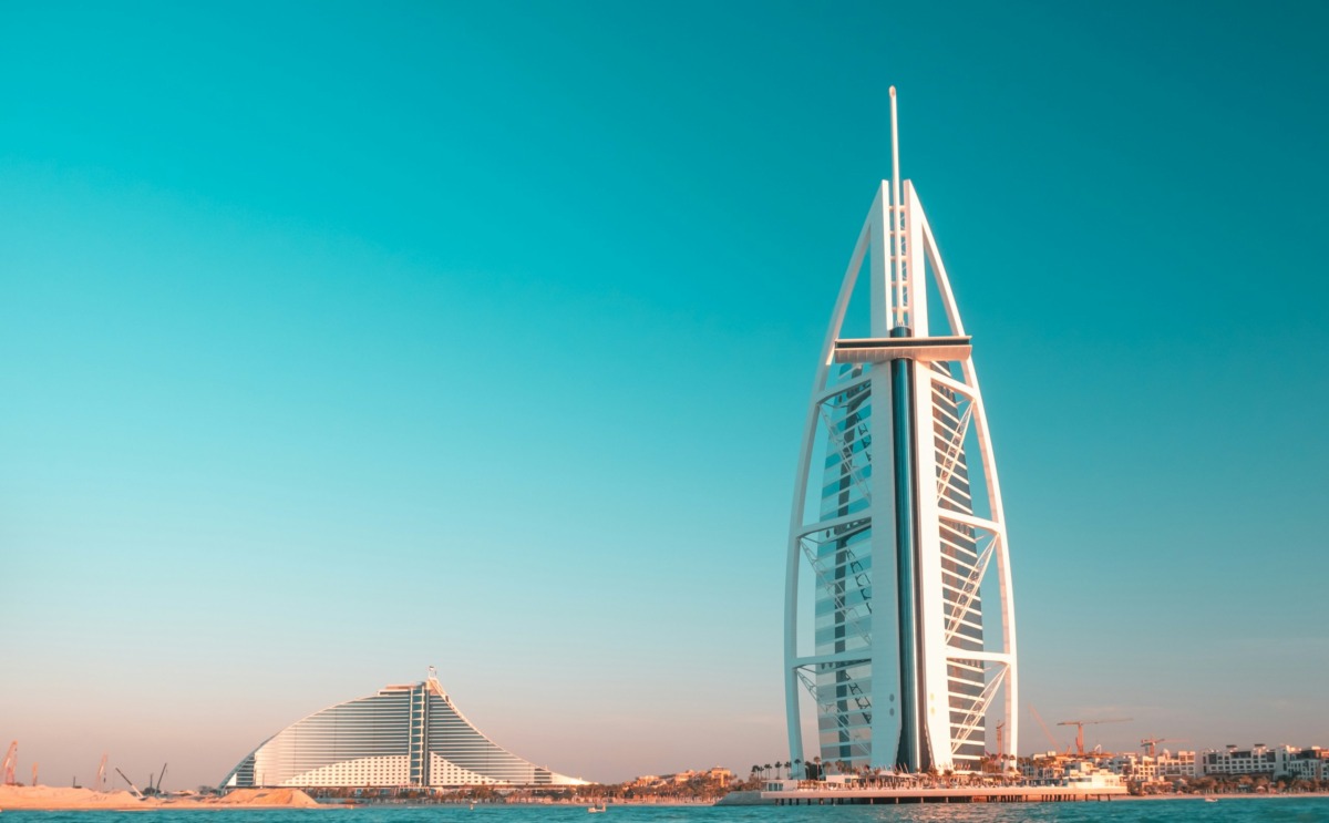 white-metal-bridge-under-blue-sky-during-daytime