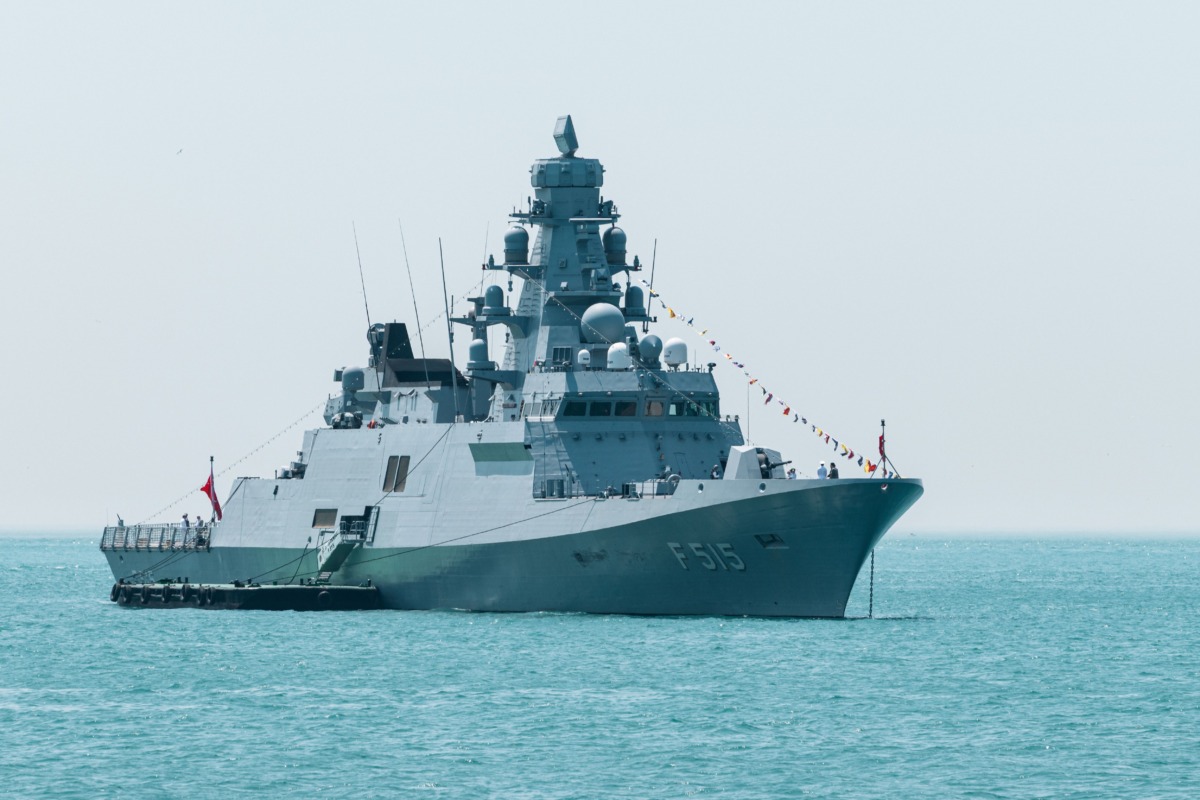 Modern naval warship cruising on calm sea