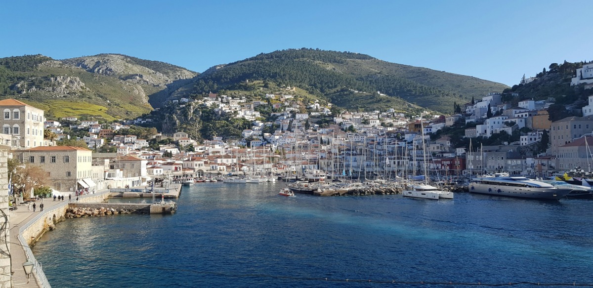 white-and-brown-concrete-buildings-near-blue-sea-under-blue-sky-during-daytime-stockpack-unsplash